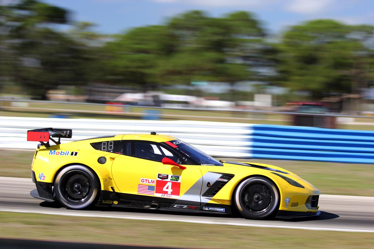 The #4 Corvette Racing C7. R heads for Turn Three Thursday morning. (Chris Jasurek/Epoch Times)
