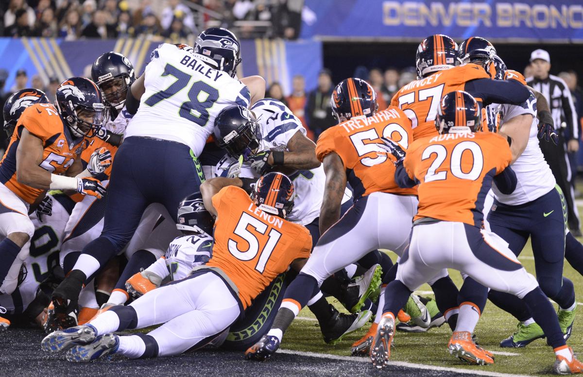 Marshawn Lynch (#24) of the Seattle Seahawks scores a 1-yard touchdown against the Denver Broncos during Super Bowl 48 at MetLife Stadium in East Rutherford, New Jersey, on February 2, 2014. (Timothy A. Clary/AFP/Getty Images)