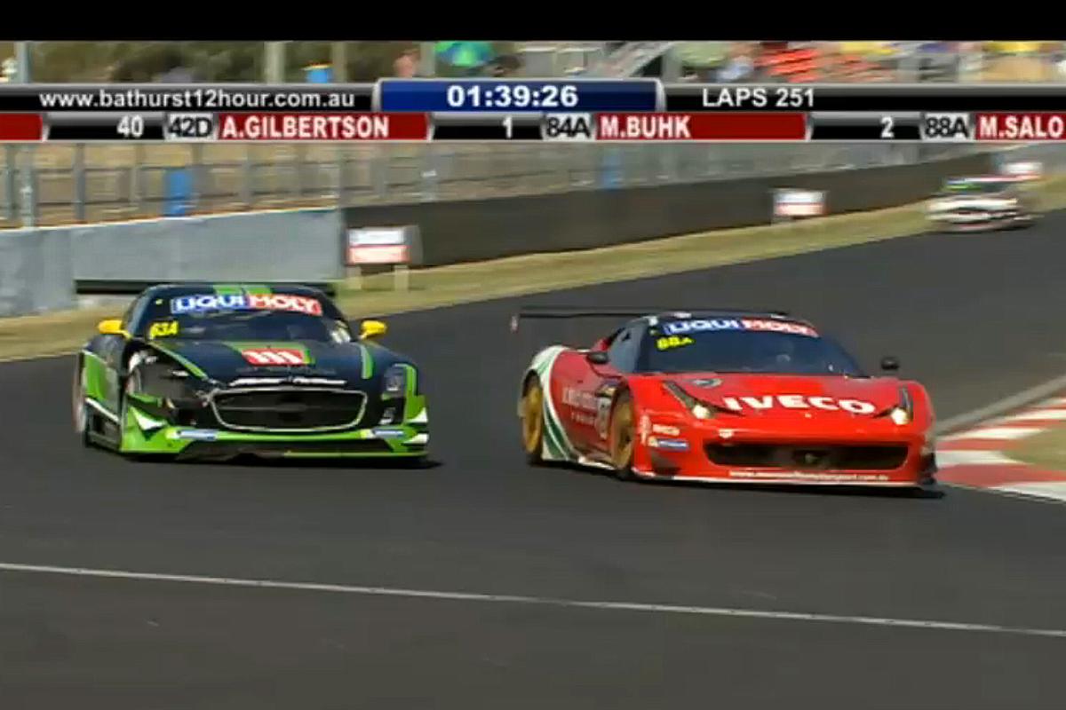 Mika Salo in the #88 Ferrari passes Greg Crick in the damaged #63 Mercedes to take second place with 1:40 left in the race. (bathurst12hour.com.au)