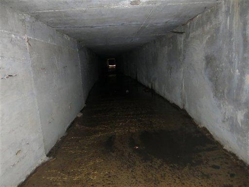 An interconnected tunnel in the city's drainage system that infamous drug boss Joaquin Guzman Loera, "El Chapo" used to evade authorities, is shown, in Culiacan, Mexico, Sunday Feb. 23, 2014. A day after troops narrowly missed infamous Guzman in Culiacan, one of his top aides was arrested. Officials said he told investigators that he picked up Guzman from a drainage pipe and helped him flee to Mazatlan but a wiretap being monitored by ICE agents in southern Arizona provided the final clue that led to the arrest of one of the world's most wanted men. (AP Photo/Adriana Gomez)