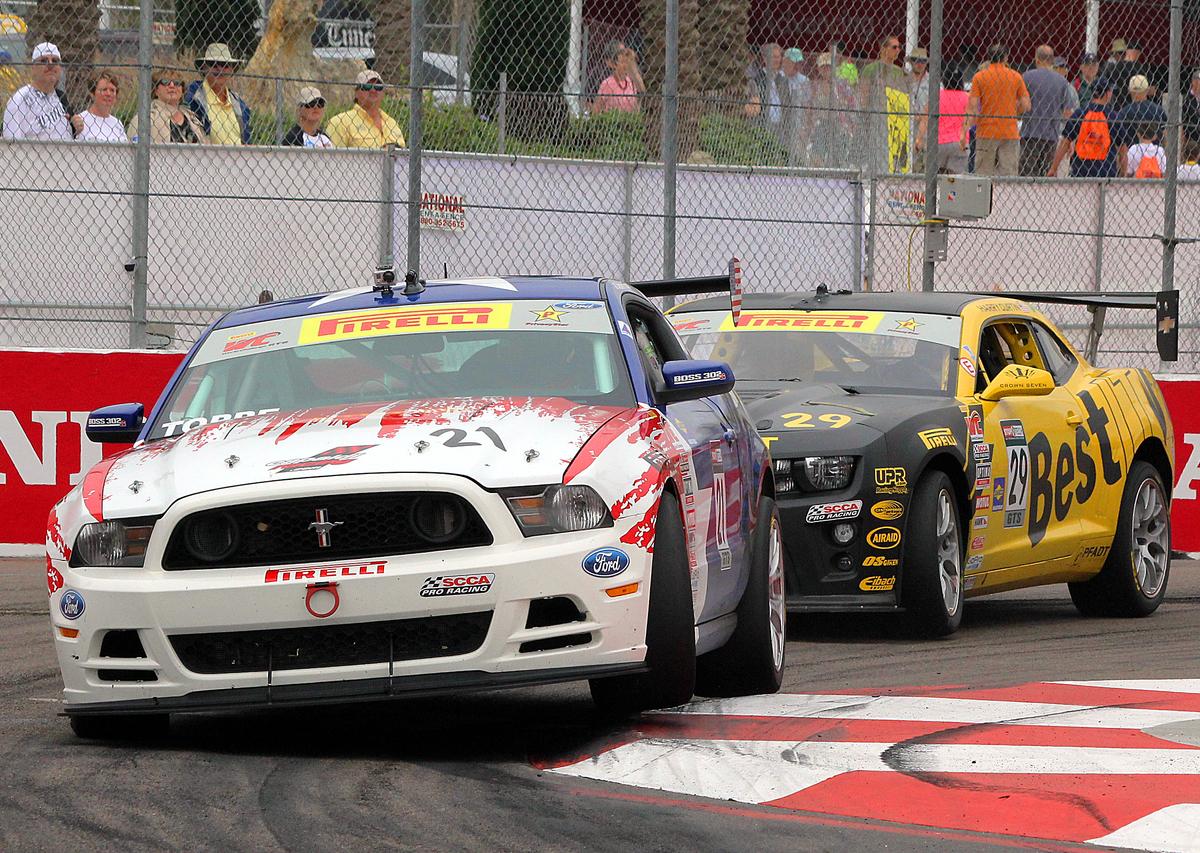Pirelli World Challenge's GTS class is often a fight between American muscle car icons, the Ford Mustang and the Chevrolet Camaro. (Chris Jasurek/Epoch Times)