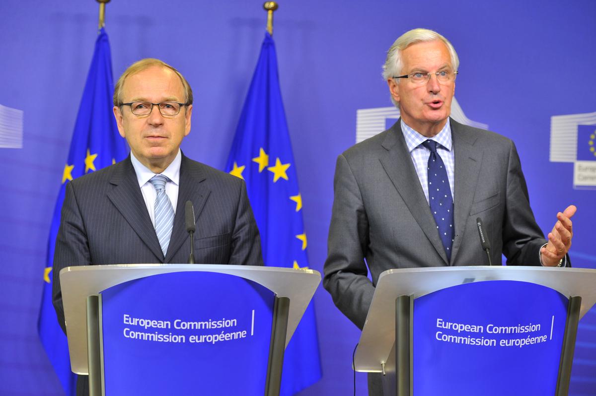 EU Commissioner for Internal Market and Services Michel Barnier (R) and the governor of the Bank of Finland, Erkki Liikanen, at a press conference in Brussels, Oct. 2, 2012. (GEORGES GOBET/AFP/GettyImages)