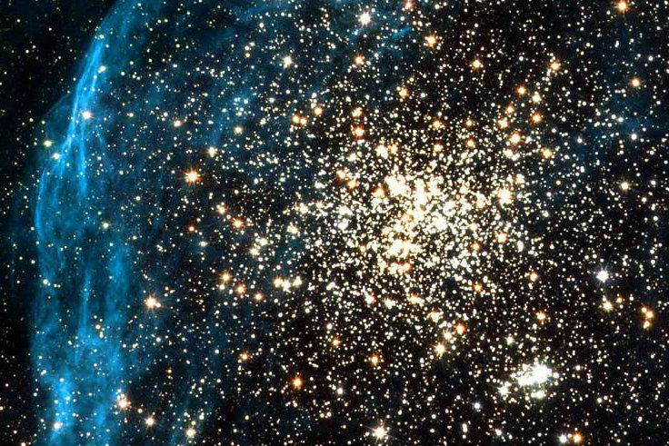 By spying on a neighboring galaxy, NASA's Hubble Space Telescope has captured an image of a young, globular-like star cluster—a type of object unknown in our Milky Way Galaxy. NASA, ESA, and Martino Romaniello (European Southern Observatory, Germany)