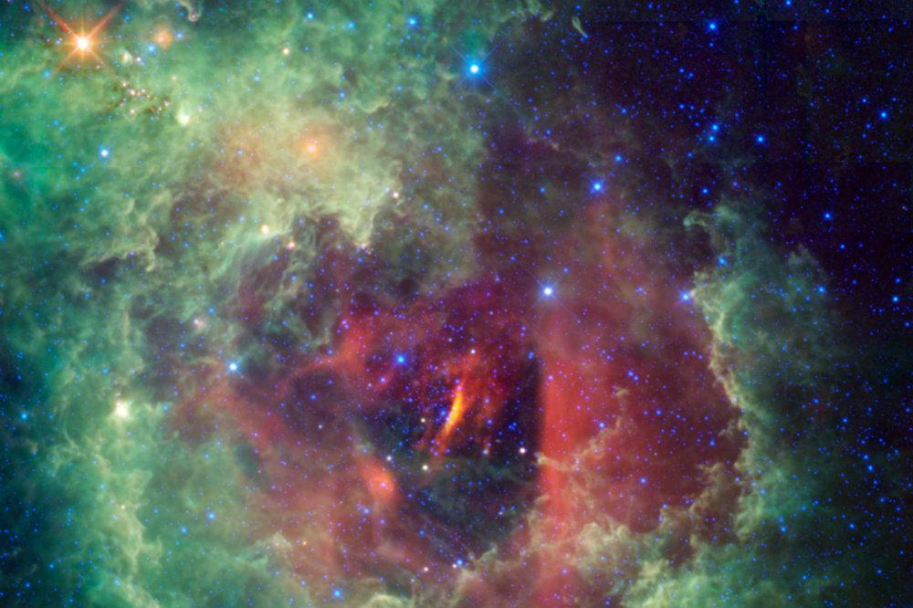 Unicorns and roses are usually the stuff of fairy tales, but this cosmic image taken by NASA's Wide-field Infrared Explorer (WISE) shows the Rosette nebula located within the constellation Monoceros, or the Unicorn. This flower-shaped nebula, also known by the less romantic name NGC 2237, is a huge star-forming cloud of dust and gas in our Milky Way galaxy. Estimates of the nebula's distance vary from 4,500 to 5,000 light-years away. (NASA/JPL-Caltech/UCLA)