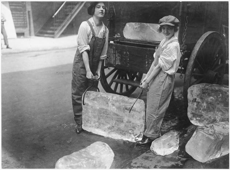 <br/>Girls help deliver ice on Sept. 16, 1918—work usually done by men—to help out during WWI.