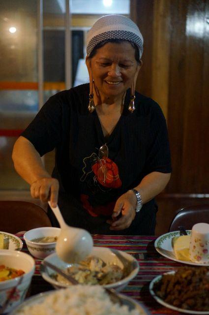 Kelabit woman cooks up some delicious local food. (Jonny Duncan, Backpacking Man)