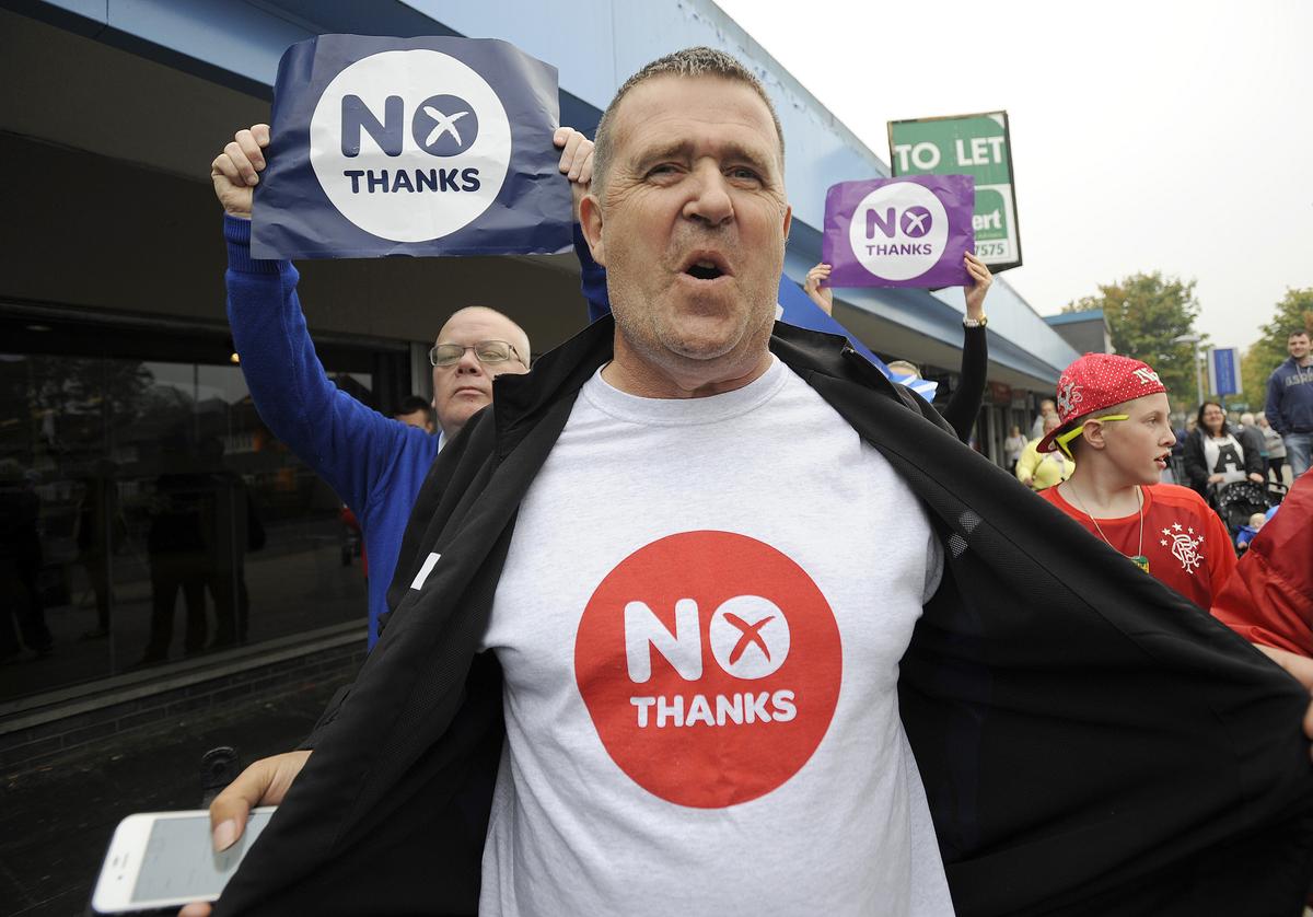 Pro-union supporters campaign during a rally by Scotland's Deputy First Minister Nicola Sturgeon in Glasgow, Scotland, on Sept. 12, 2014, ahead of the referendum on Scotland's independence. (Andy Buchanan/AFP/Getty Images)