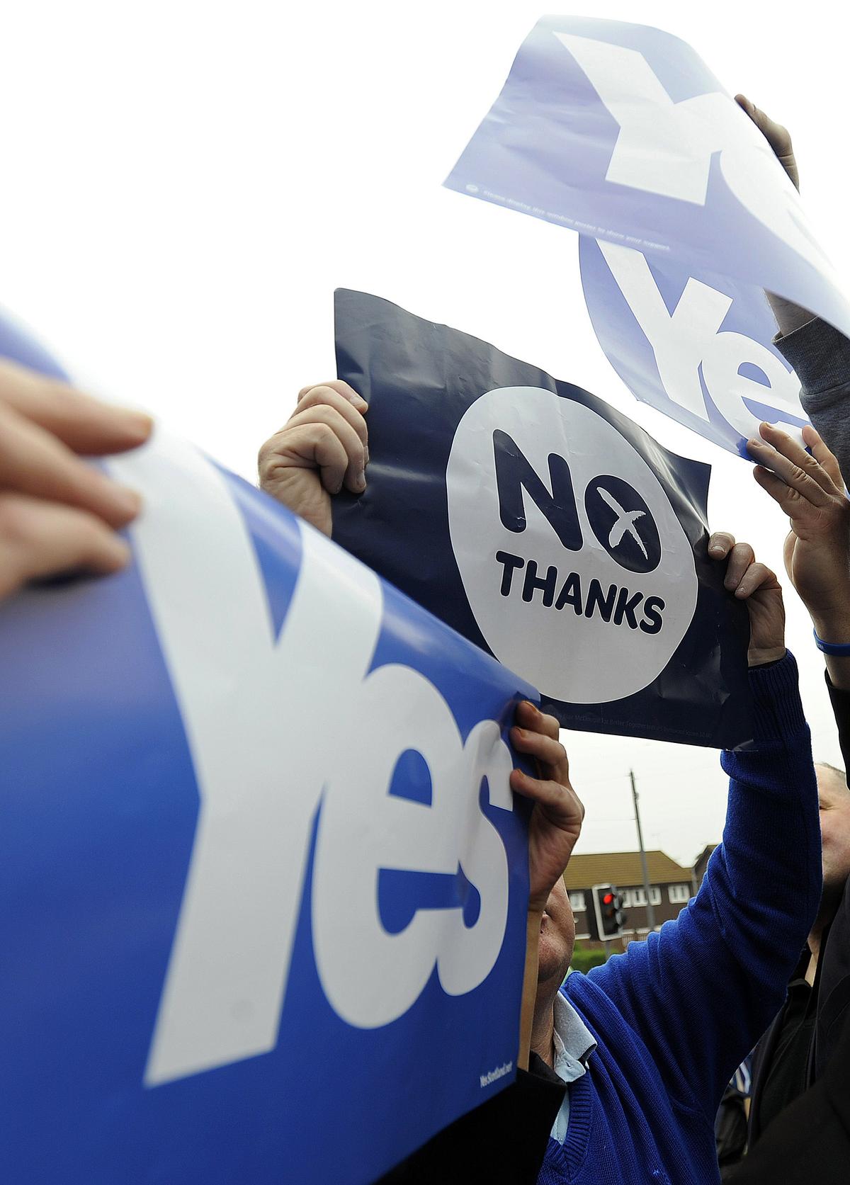 Pro-union and pro-independence campaigners jostle for space during a pro-independence rally by Scotland's Deputy First Minister Nicola Sturgeon in Glasgow, Scotland, on Sept. 12, 2014, ahead of the referendum on Scotland's independence. (Andy Buchanan/AFP/Getty Images)