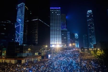 Pro-democracy demonstrators gather for the third night in Hong Kong on Sept. 30, 2014. (Philippe Lopez/AFP/Getty Images)