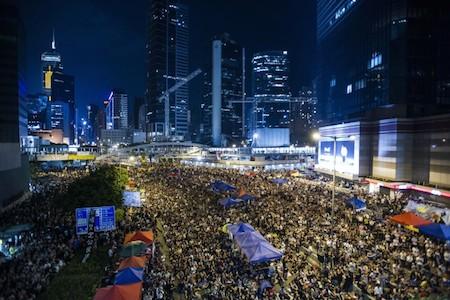Thousands of pro-democracy protesters fill what they now calling 'Umbrella Square' in the central district of Hong Kong where all of the Government offices are located, on Oct. 10, 2014. (Xaume Olleros/AFP/Getty Images)