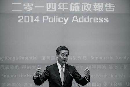Chief Executive Leung Chun-ying gestures during a press conference after his 2014 policy address in Hong Kong on Jan. 15. Leung has reportedly pocketed millions from a business deal with Australian engineering firm UGL, raising charges of a conflict of interest. (Philippe Lopez/AFP/Getty Images)