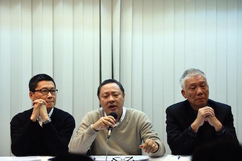 Pro-democracy activists Benny Tai (C) attends a press conference with Chan Kin-man (L) and Chu Yiu-ming (R) in Hong Kong on Dec. 2, 2014. (Johannes Eisele/AFP/Getty Images)