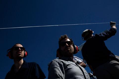 The authors try their hand at at amateur orthophotography on board Earl Armstrong's airboat near the West Bay diversion project at the mouth of the Mississippi River. (Edmund D. Fountain for ProPublica/The Lens)