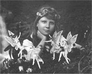 The first of the five photographs, taken by Elsie Wright in 1917, shows Frances Griffiths with the alleged fairies. (<a href="http://en.wikipedia.org/wiki/File:Cottingley_Fairies_1.jpg" target="_blank">Wikimedia Commons</a>)