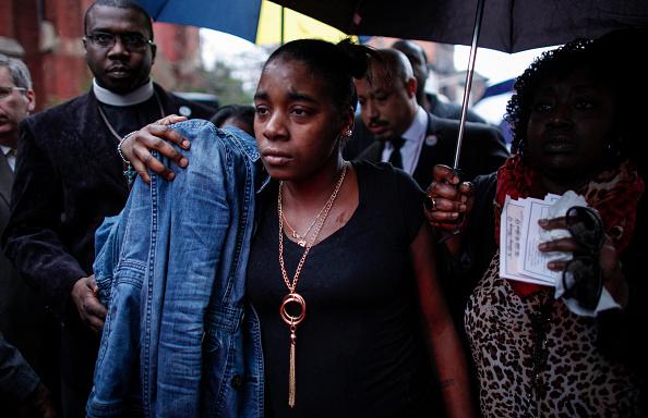 : Family members of Akai Gurley attend his funeral service at the Brown Memorial Baptist Church on December 6, 2014 in the Brooklyn borough of New York City. (Kena Betancur/Getty Images)
