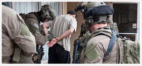 FBI SWAT team making an arrest. (Courtesy of FBI)