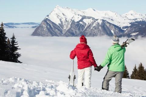 (<a href="http://www.shutterstock.com/pic-101025169/stock-photo-couple-admiring-mountain-view-whilst-on-ski-holiday-in-mountains.html?src=qJa-bcLQBH7KexhdsJXdGA-1-20&ws=1" target="_blank">Shutterstock</a>*)
