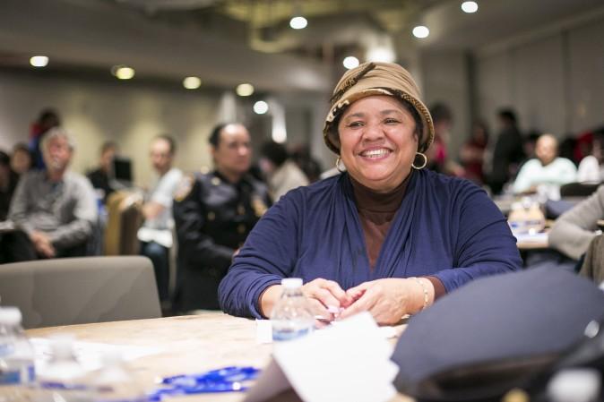 The Rev. Georgette Morgan-Thomas moderates a discussion at her roundtable on how to improve police–community relations, in Washington Heights, Manhattan, on Feb. 2. (Samira Bouaou/Epoch Times)