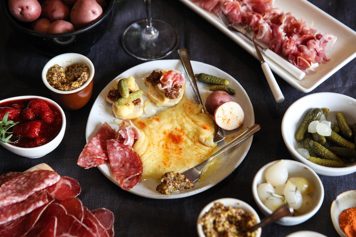 A plate of swiss raclette cheese surrounded by various cured meats, spreads, and breads. Had this course not been so good, perhaps I wouldn't have descended into food coma. (Deer Valley Resort)