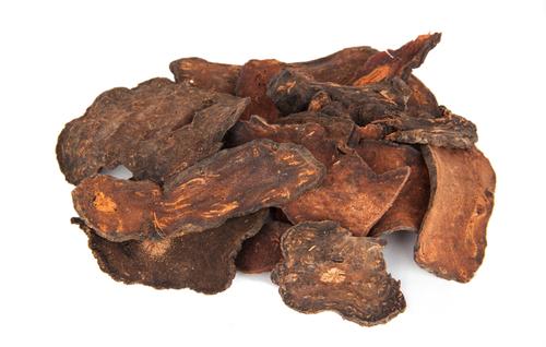 He shou wu root is usually sold dried and sliced. Good quality herb has a reddish brown color. Shutterstock