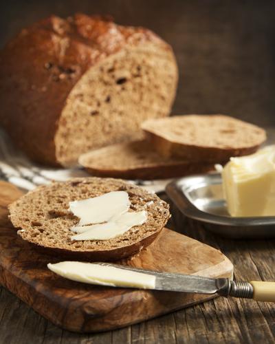 Every single cell in our body has a cell wall which is constructed from both saturated and unsaturated fat and cholesterol. (<a href="http://www.shutterstock.com/pic-161756183/stock-photo-fresh-rye-bread-and-butter.html?src=bJSAoJ6cWxKleZbvos7nYw-1-2&ws=1" target="_blank">Shutterstock</a>)