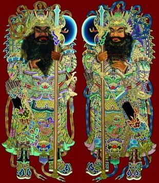 Two formidable door gods, elaborate representations that often adorn temples. (NTD Television)