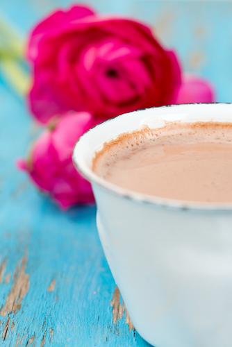 Try a hot carob beverage: (<a href="http://www.shutterstock.com/pic-176106392/stock-photo-hot-chocolate-and-heart-shaped-marshmallow-on-wooden-surface.html?src=s3LY-iJ7ZyE4XXr2QwILAg-1-0&ws=1" target="_blank" rel="noopener">Shutterstock</a>)