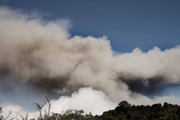 Ash spewed from the Turrialba volcano heads towards San Jose and its surroundings on March 13, 2015. The volcano showered nearby towns with ash forcing evacuations from areas in its vicinity about 80 km from the crater. AFP PHOTO / EZEQUIEL BECERRA (Photo credit should read EZEQUIEL BECERRA/AFP/Getty Images)