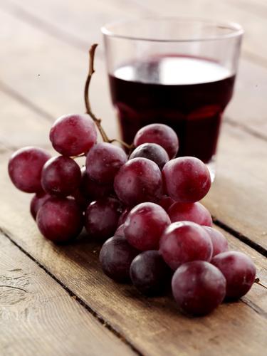 Try a tall glass of fresh grape juice without added water and sugar, or try adding whole grapes to your smoothie. (<a href="http://www.shutterstock.com/pic-86741596/stock-photo-fresh-grapes.html?src=2SdORWwqns1Td4wQH6S9IA-1-25" target="_blank" rel="noopener">Shutterstock</a>)