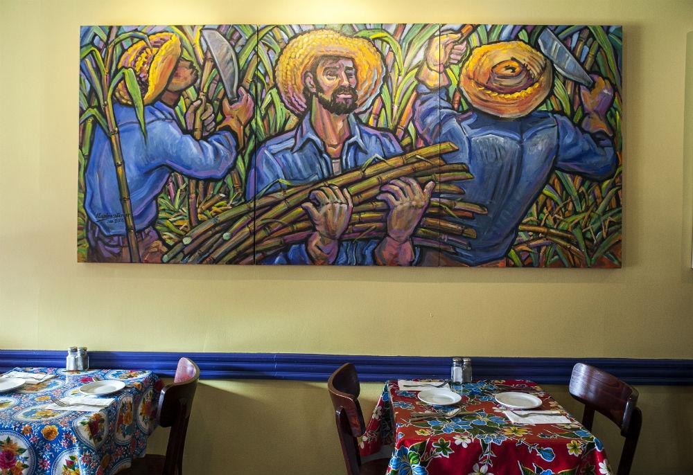 A painting by Presilla's father, at her Hoboken restaurant Cucharamama.<br/>(Samira Bouaou/Epoch Times)
