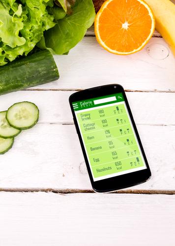 The main goal is to keep carbs under 20–50 grams per day and get the rest of your calories from protein and fat. (<a href="http://www.shutterstock.com/pic-197368316/stock-photo-counting-calories-in-smartphone-concept-of-app-for-healthcare.html?src=_Sa1OTkNov_QNHlny6svIw-1-7" target="_blank">Shutterstock</a>)