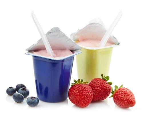 Low-fat yogurt is yogurt that has had the good stuff (saturated fat) removed. (<a href="http://www.shutterstock.com/pic-216436942/stock-photo-two-various-plastic-yogurt-pots-isolated-on-a-white-background.html?src=LXx2fyz83hpiItySx4zEIg-1-4" target="_blank">Shutterstock</a>)