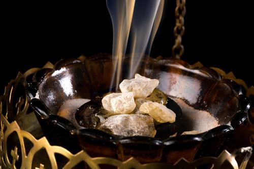 (<a href="http://www.shutterstock.com/pic-160212503/stock-photo-closeup-of-real-smoking-church-incense-on-burning-charcoal.html?src=2PHtfP_zxraYvRll7VYtdg-1-25" target="_blank">Shutterstock</a>)
