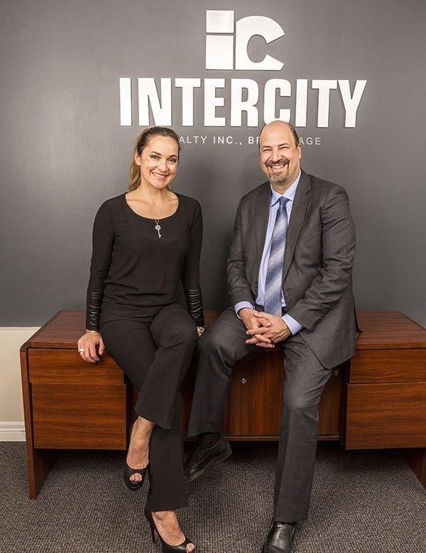 Marketing director Alda Neves Dubé and broker and manager Lou Grossi of Intercity Realty. (Courtesy of Intercity Realty/ City Life Magazine Vaughan Woodbridge)