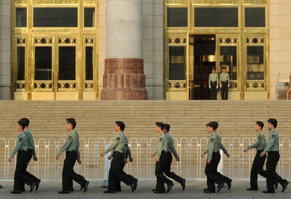 <a href="https://www.theepochtimes.com/assets/uploads/2015/07/144549606.jpg"><br/><img class="size-large wp-image-243903" title="Chinese military policemen march past th" src="https://www.theepochtimes.com/assets/uploads/2015/07/144549606.jpg" alt="" width="590" height="404"/></a>