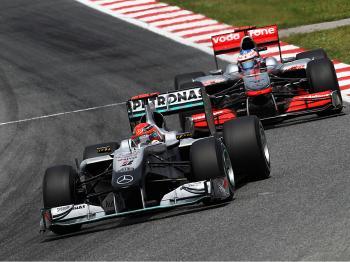 <a href="https://www.theepochtimes.com/assets/uploads/2015/07/1shubutton98936594_medium.jpg"><img src="https://www.theepochtimes.com/assets/uploads/2015/07/1shubutton98936594_medium.jpg" alt="Michael Schumacher leads Jenson Button during the Spanish Formula One Grand Prix. (Paul Gilham/Getty Images)" title="Michael Schumacher leads Jenson Button during the Spanish Formula One Grand Prix. (Paul Gilham/Getty Images)" width="320" class="size-medium wp-image-105228"/></a>