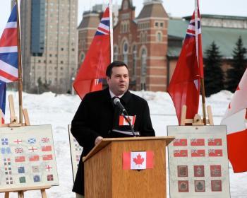Jason Kenney, Minister of Citizenship, Immigration and Multiculturalism, speaks at a flag-raising ceremony at Ottawa City Hall on Feb. 15, 2010, in honour of National Flag of Canada Day and the 45th anniversary of the iconic Canaidan maple leaf flag. (The Epoch Times)