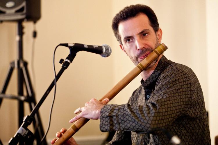 Brooklyn-based Eric Fraser, playing a bamboo "bansuri" flute, among the oldest instruments known to mankind, at Chandayan's Ragas for Truth, Compassion, and Tolerance, Sept. 28 in New York. (Amal Chen/The Epoch Times)