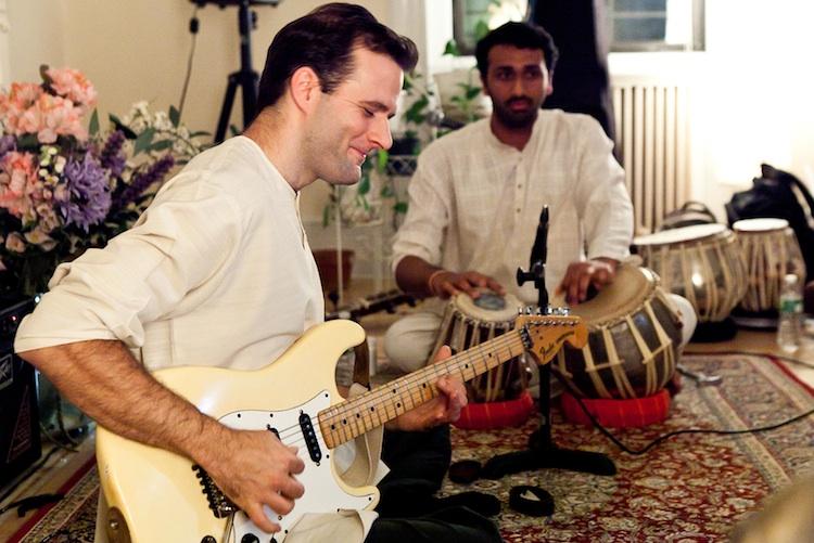 Event organizer Nemanja Rebic (L) playing the electric guitar, and Abhisekh Sankaran (R) on tabla at Chandayan's Ragas for Truth, Compassion, and Tolerance, Sept. 28 in New York.