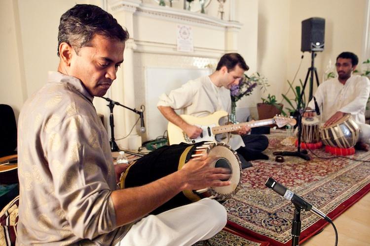 Bala Skandan (L) on mridangam, Nemanja Rebic (C) on electric guitar, and Abhisekh Sankaran (R) on tabla at Chandayan's Ragas for Truth, Compassion, and Tolerance, Sept. 28 in New York.