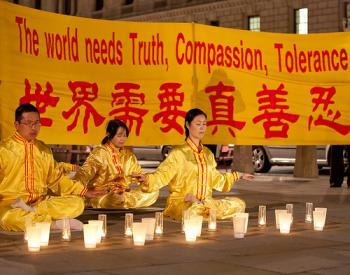 <a href="https://www.theepochtimes.com/assets/uploads/2015/07/Candlelight_vigil_parliament_medium.jpg"><img src="https://www.theepochtimes.com/assets/uploads/2015/07/Candlelight_vigil_parliament_medium.jpg" alt="Falun Gong practitioners meditate into the night during a candlelight vigil (Roger Lou/Epoch Times Staff)" title="Falun Gong practitioners meditate into the night during a candlelight vigil (Roger Lou/Epoch Times Staff)" width="320" class="size-medium wp-image-89579"/></a>