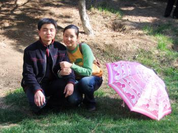 <a href="https://www.theepochtimes.com/assets/uploads/2015/07/CoupleumbrellaY_medium.jpg"><img src="https://www.theepochtimes.com/assets/uploads/2015/07/CoupleumbrellaY_medium.jpg" alt="Tian Lu with her husband Cong Rixu before he was detained in China. (Courtesy of Tian Lu)" title="Tian Lu with her husband Cong Rixu before he was detained in China. (Courtesy of Tian Lu)" width="320" class="size-medium wp-image-123939"/></a>