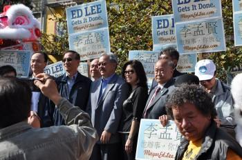 <a href="https://www.theepochtimes.com/assets/uploads/2015/07/DSC_1400_medium.JPG"><img class="size-medium wp-image-134369" title="Mayoral candidate Ed Lee standing among supporters at an official campaign event at Portsmouth Square on Oct. 15. Shortly after he left the event, the witness saw an apparent campaign worker receive a Vote-by-Mail ballot from a voter. (Epoch Times)" src="https://www.theepochtimes.com/assets/uploads/2015/07/DSC_1400_medium.JPG" alt="Mayoral candidate Ed Lee standing among supporters at an official campaign event at Portsmouth Square on Oct. 15. Shortly after he left the event, the witness saw an apparent campaign worker receive a Vote-by-Mail ballot from a voter. (Epoch Times)" width="320"/></a>