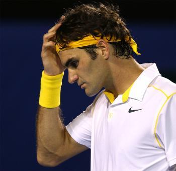 <a href="https://www.theepochtimes.com/assets/uploads/2015/07/Fedeerr108426009WEB_medium.jpg"><img src="https://www.theepochtimes.com/assets/uploads/2015/07/Fedeerr108426009WEB_medium.jpg" alt="Roger Federer reacts in his semifinal match against Novak Djokovic. (Mark Dadswell/Getty Images)" title="Roger Federer reacts in his semifinal match against Novak Djokovic. (Mark Dadswell/Getty Images)" width="320" class="size-medium wp-image-119538"/></a>