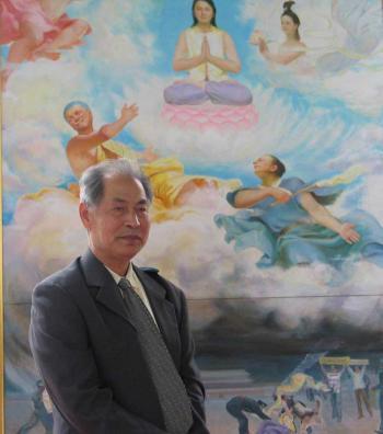 EVIL PUNISHED: Professor Kunlun Zhang poses before his oil painting "Positioning" (2003), which depicts the belief that good is rewarded and evil punished. At the top, the gods in heaven welcome a Falun Gong practitioner who was tortured to death whi (courtesy of pureinsight.org)