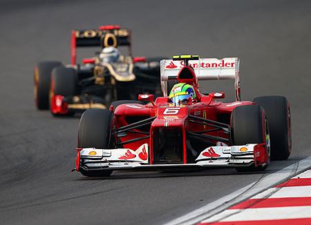 <a href="https://www.theepochtimes.com/assets/uploads/2015/07/Massa154104757WEB.jpg"><img class="size-full wp-image-303374" src="https://www.theepochtimes.com/assets/uploads/2015/07/Massa154104757WEB.jpg" alt="Felipe Massa of Ferrari leads Kimi Raikkönen of Lotus during the Formula One Korean Grand Prix. (Clive Mason/Getty Images)" width="450" height="326"/></a>