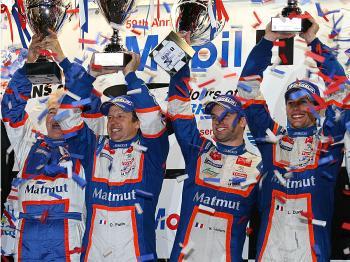 Team Oreca Matmut owner Hugues de Chaunac and drivers Olivier Panis, Nicolas Lapierre and Loic Duval celebrate victory in the 2011 Sebring Twelve Hours. (Chris Jasurek/Epoch Times)