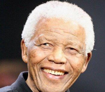 <a href="https://www.theepochtimes.com/assets/uploads/2015/07/NELSONMANDELA-C_medium.jpg"><img src="https://www.theepochtimes.com/assets/uploads/2015/07/NELSONMANDELA-C_medium.jpg" alt="Nelson Mandela, the first democratic president of South Africa, signaling the ultimate end of white rule under the apartheid system.  (Dave Hogan/Getty Images)" title="Nelson Mandela, the first democratic president of South Africa, signaling the ultimate end of white rule under the apartheid system.  (Dave Hogan/Getty Images)" width="320" class="size-medium wp-image-99363"/></a>