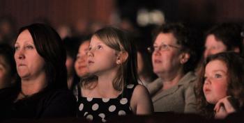 ENTRANCED: Two little girls are mesmerized by the performance of Shen Yun, in Melbourne, Australia, on May 25. (Ming Chen/Epoch Times)