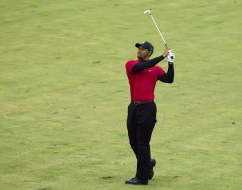<a href="https://www.theepochtimes.com/assets/uploads/2015/07/TigerWoods_medium.jpg"><img src="https://www.theepochtimes.com/assets/uploads/2015/07/TigerWoods_medium.jpg" alt="Tiger Woods hitting his shot to the ninth green on Sunday. He parred the hole and finished the first nine holes at even par 36. (Dan Sanchez/The Epoch Times)" title="Tiger Woods hitting his shot to the ninth green on Sunday. He parred the hole and finished the first nine holes at even par 36. (Dan Sanchez/The Epoch Times)" width="320" class="size-medium wp-image-116738"/></a>